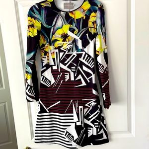 Size Med- Clover Canyon slight worn mixed print mini. Excellent condition.